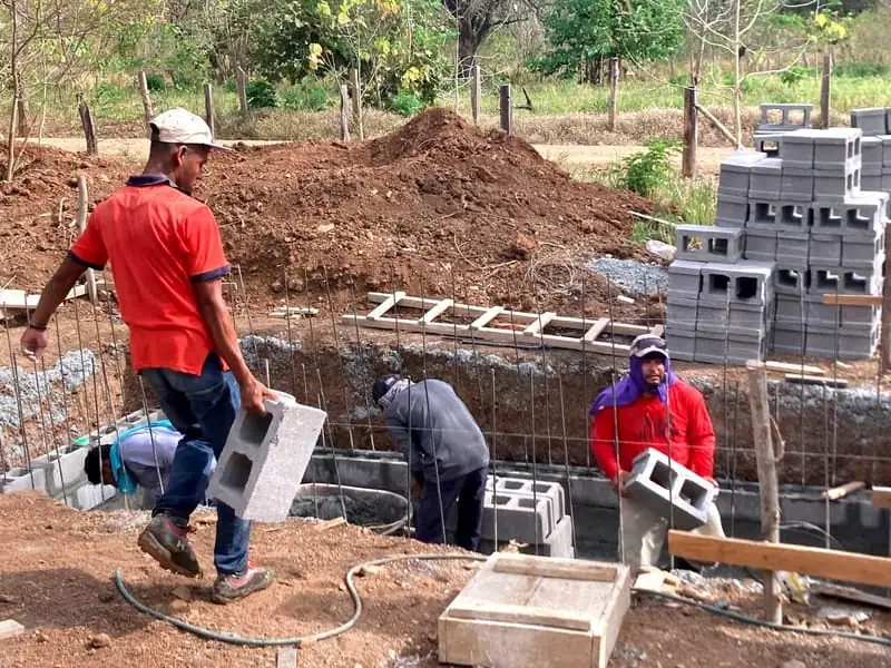 A house under construction in the project