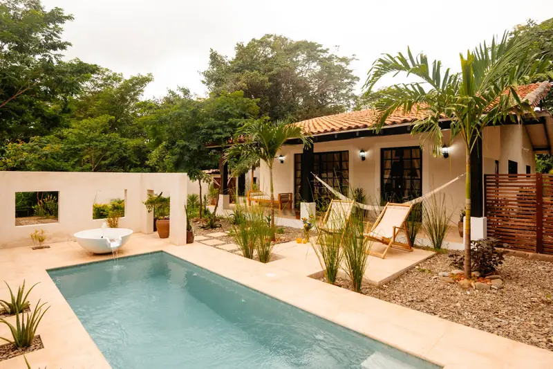 Villa Mariposa, its pool and garden
